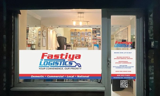 The Fastiya Logistics office on 38 Trinity Road in Tooting, lit up at night