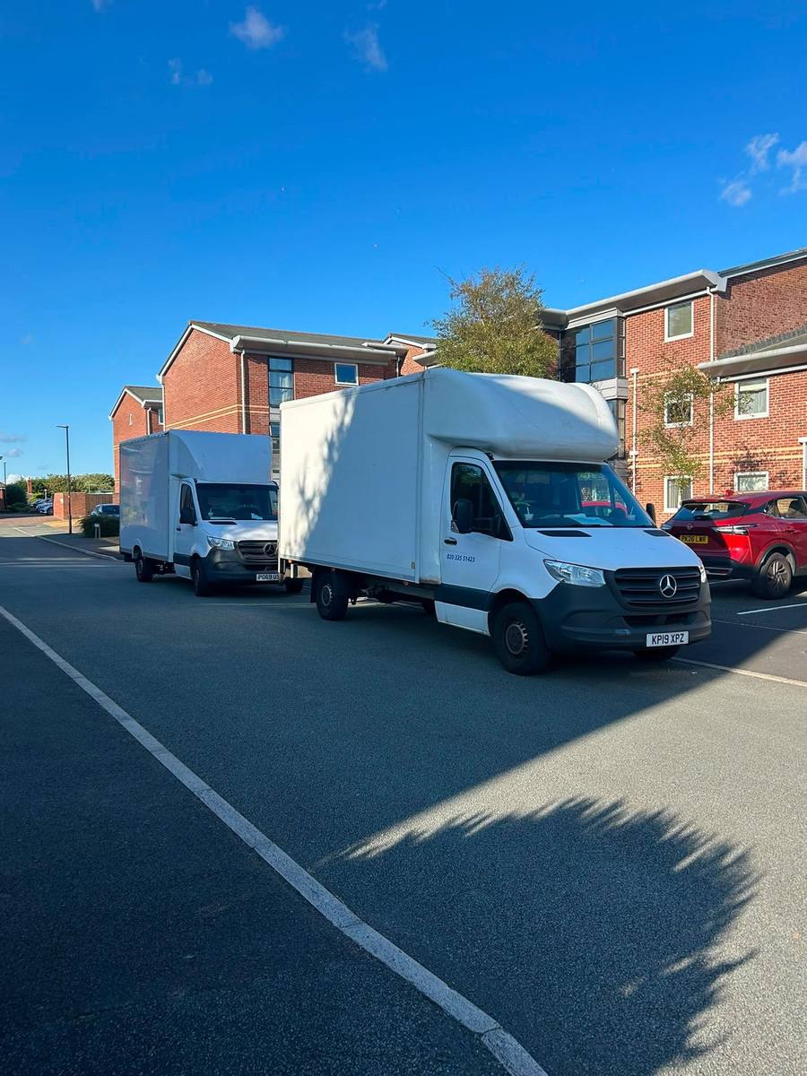 A Fastiya Logistics crew loading a van on a removals job near Streatham