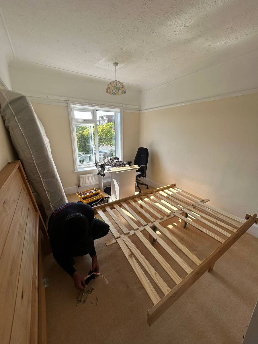 A bed base being rebuilt in the new room