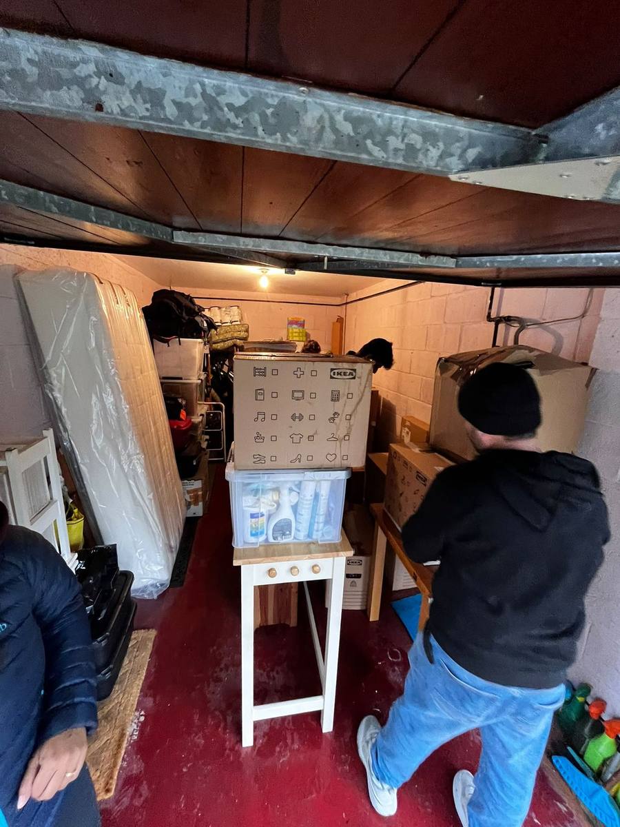 A mattress carried out ready for the van